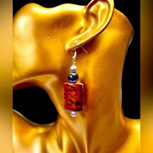 Animal motif earrings in French wire NEW